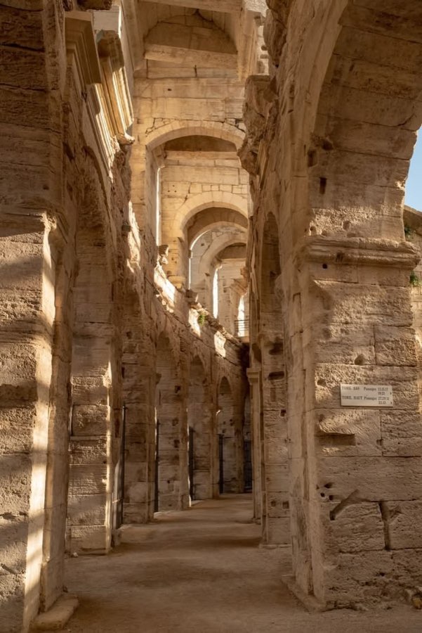 Stone arcades inside an ancient amphitheatre